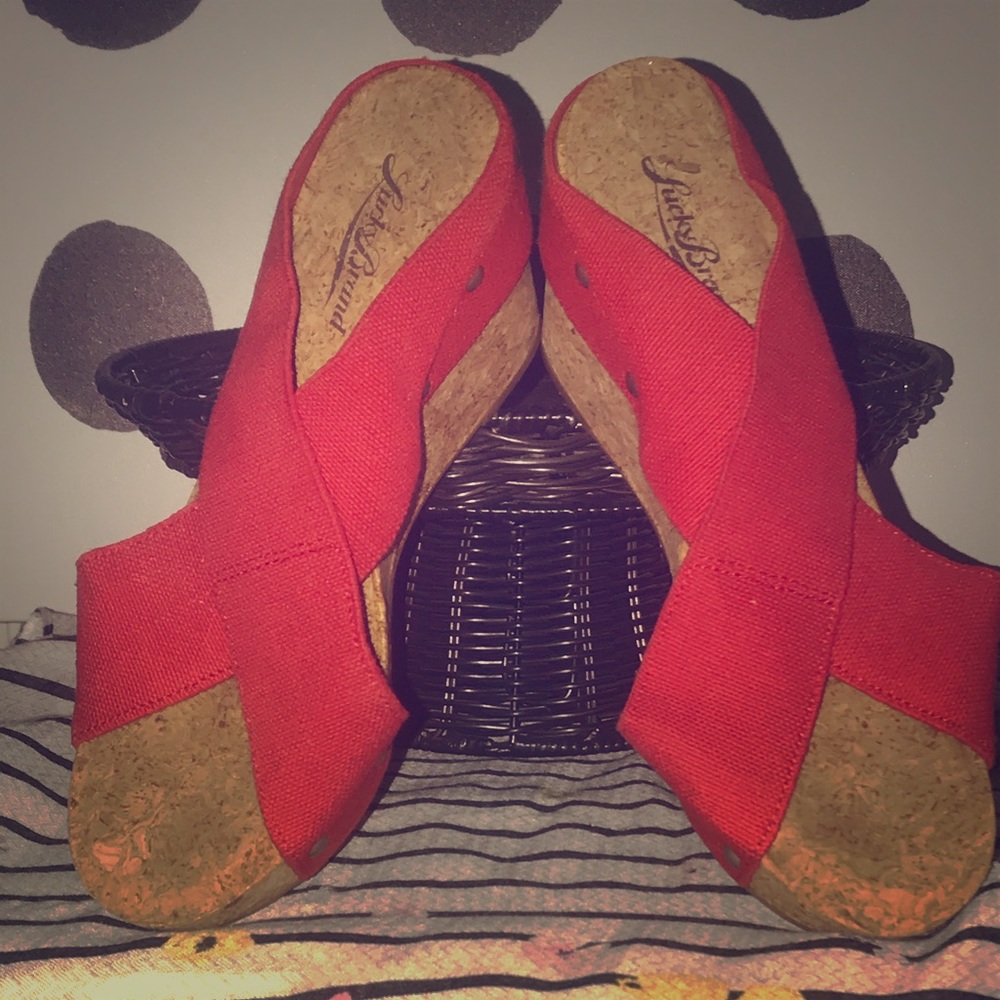 Lucky Brand red wedge sandal with stud accents.